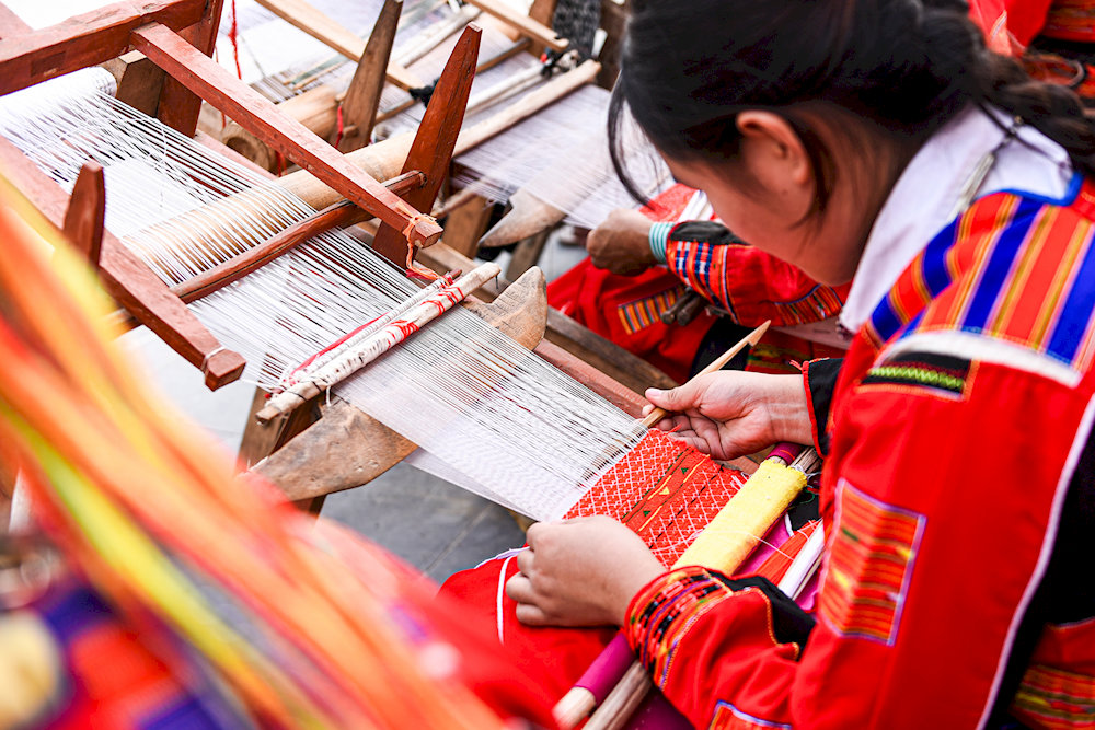 Visitors can watch the weavers at work and even participate in workshops to learn this unique craft